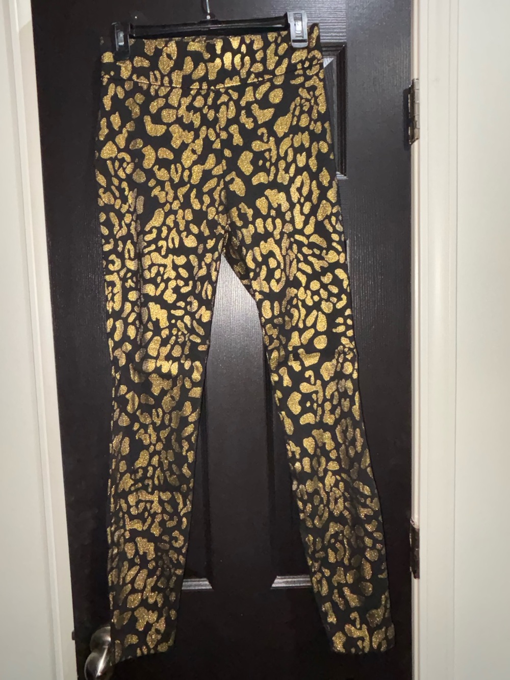 New York & Company Black Skinny Pants with Gold Leopard Print
